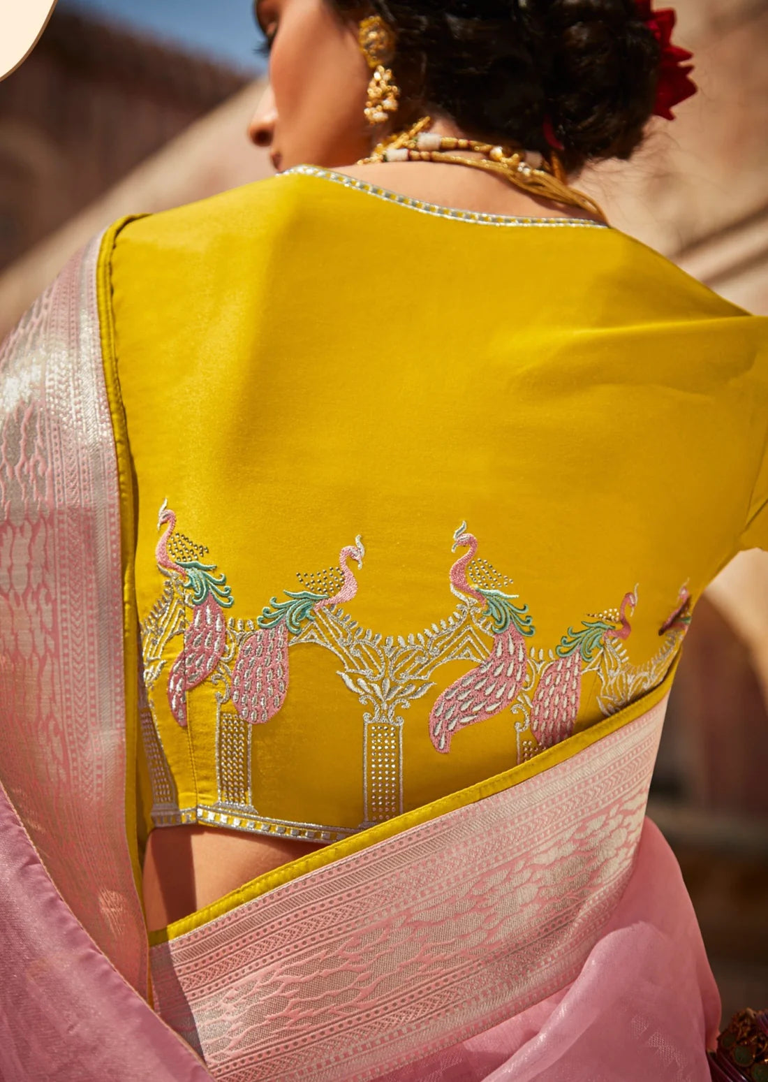 heavy hand embroidery work on yellow silk blouse
