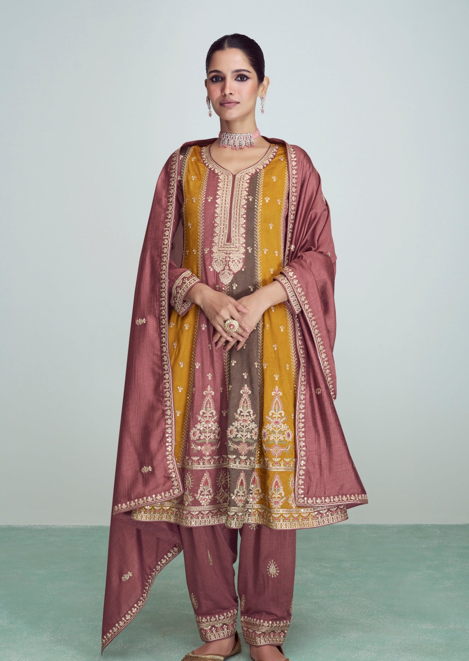 Bride in brown multicolor heavy neck design salwar suit with dupatta