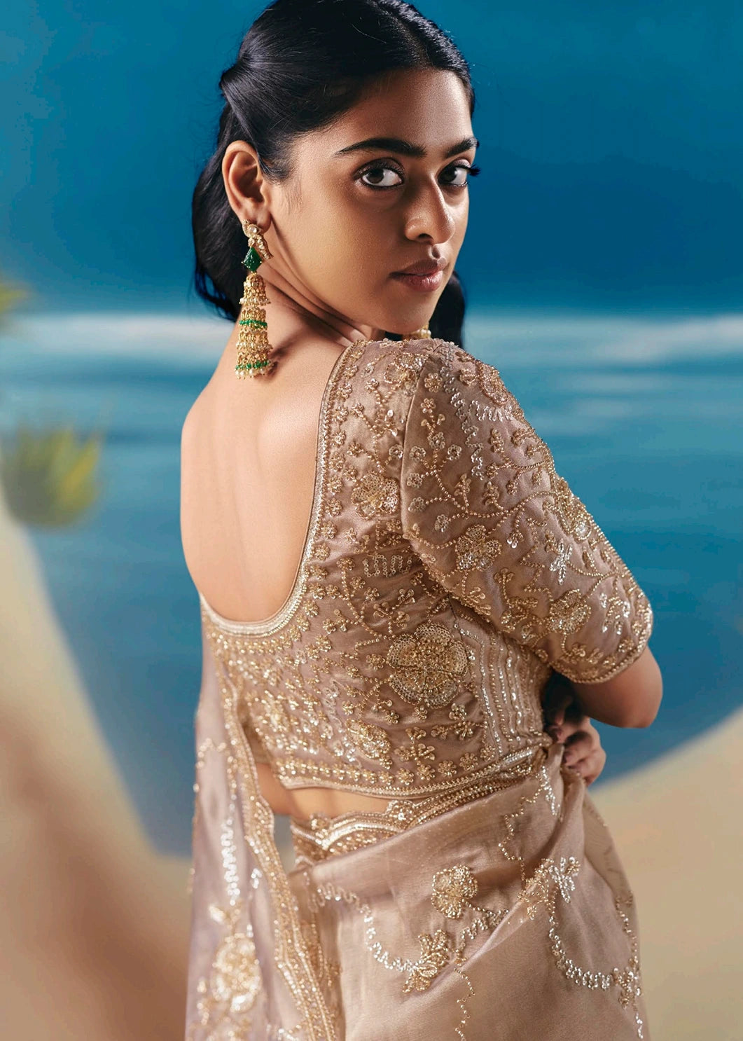Contemporary ivory beige hand embroidered organza tissue saree with subtle sequin and bead accents for reception, cocktail party or modern indian bridal look.