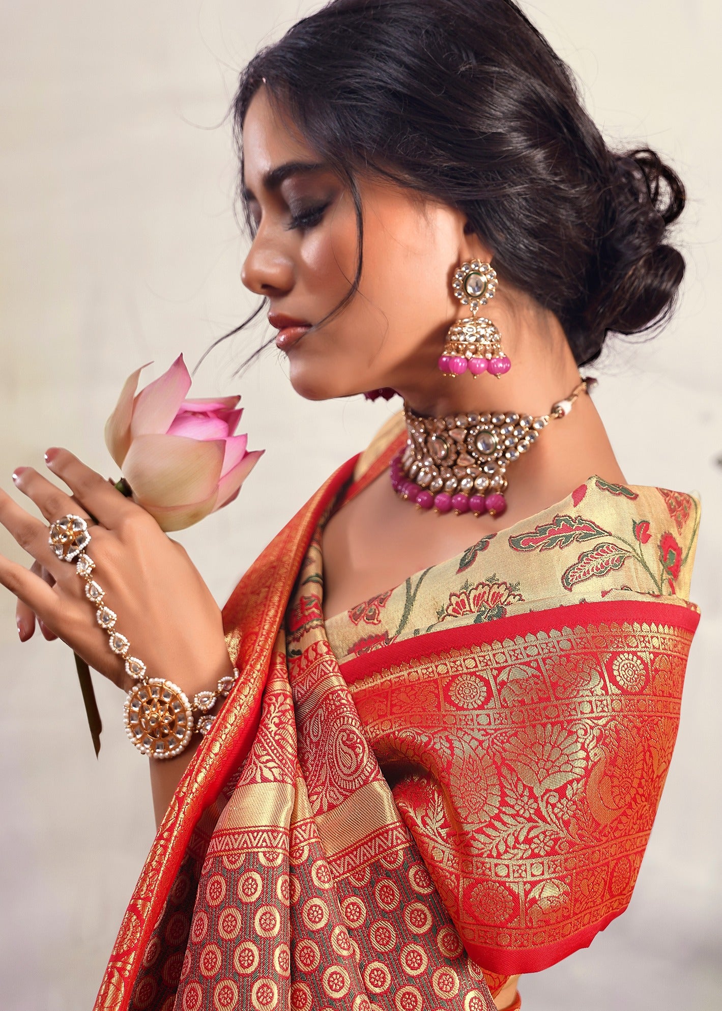 Cream and red handloom banarasi silk saree blouse online shopping for wedding look.