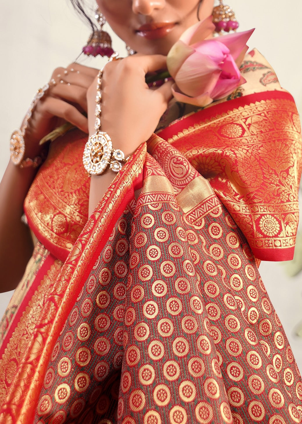 Cream handloom banarasi silk saree with red blouse online design.