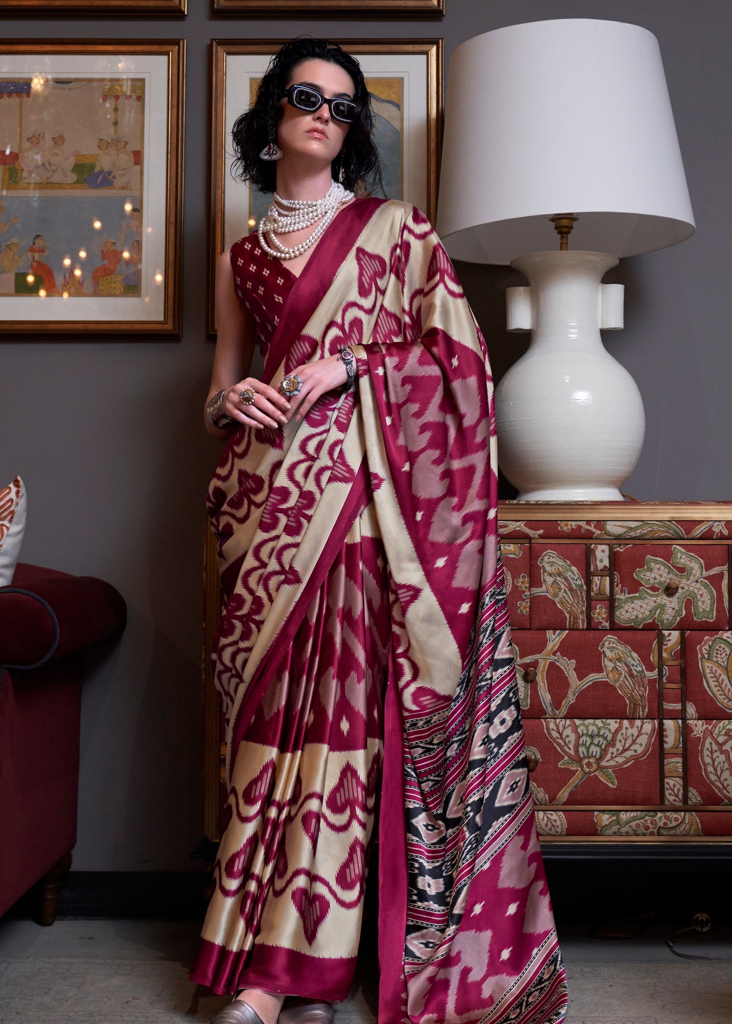 Luxurious cream and red printed saree online usa in pure satin crepe fabric, featuring intricate floral designs and a red blouse.