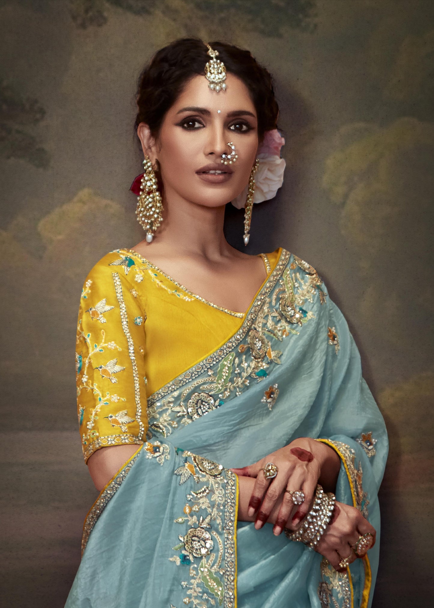 Crushed tissue saree online with handwork embroidery in sky blue colour with yellow blouse.