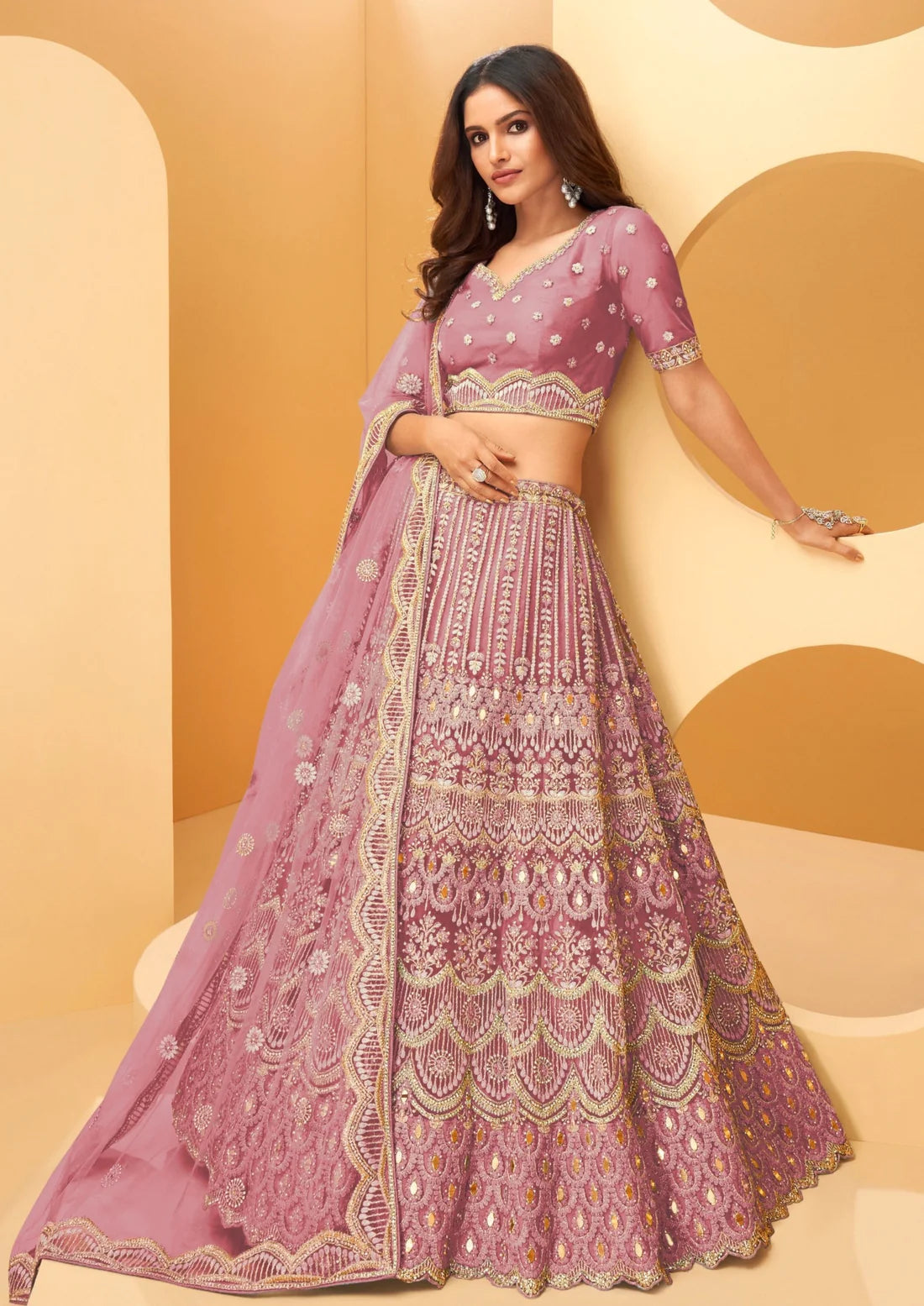 Bride in designer light pink bridal lehenga choli online shopping price usa.