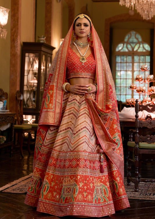 Bride in pure silk orange lehenga choli