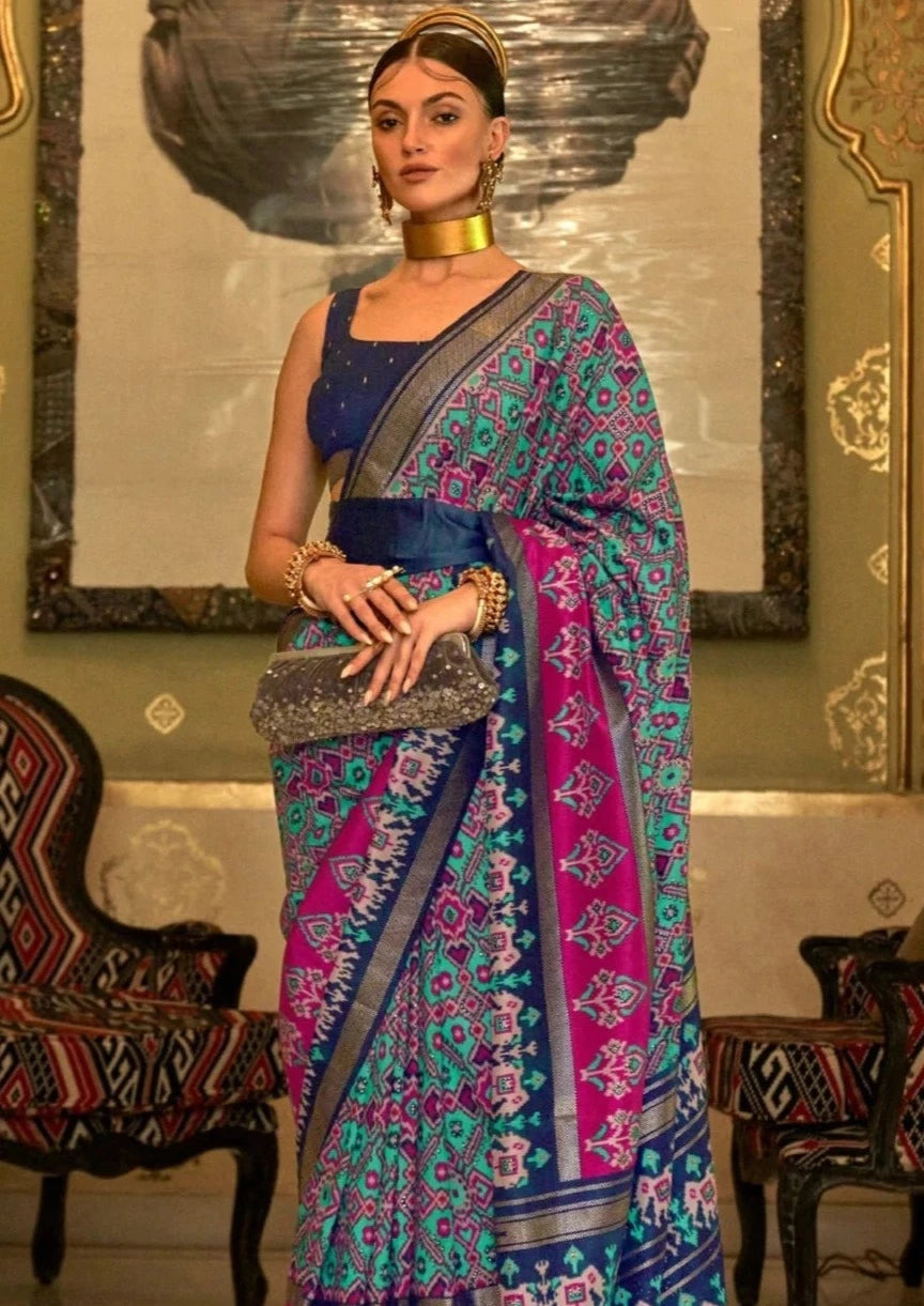 Double ikkat patola saree online shopping green and blue contrast for wedding.