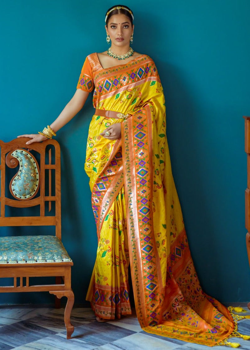 Fusion banarasi patola silk yellow saree with orange paithani border and pallu, perfect for wedding function or bridal wear.