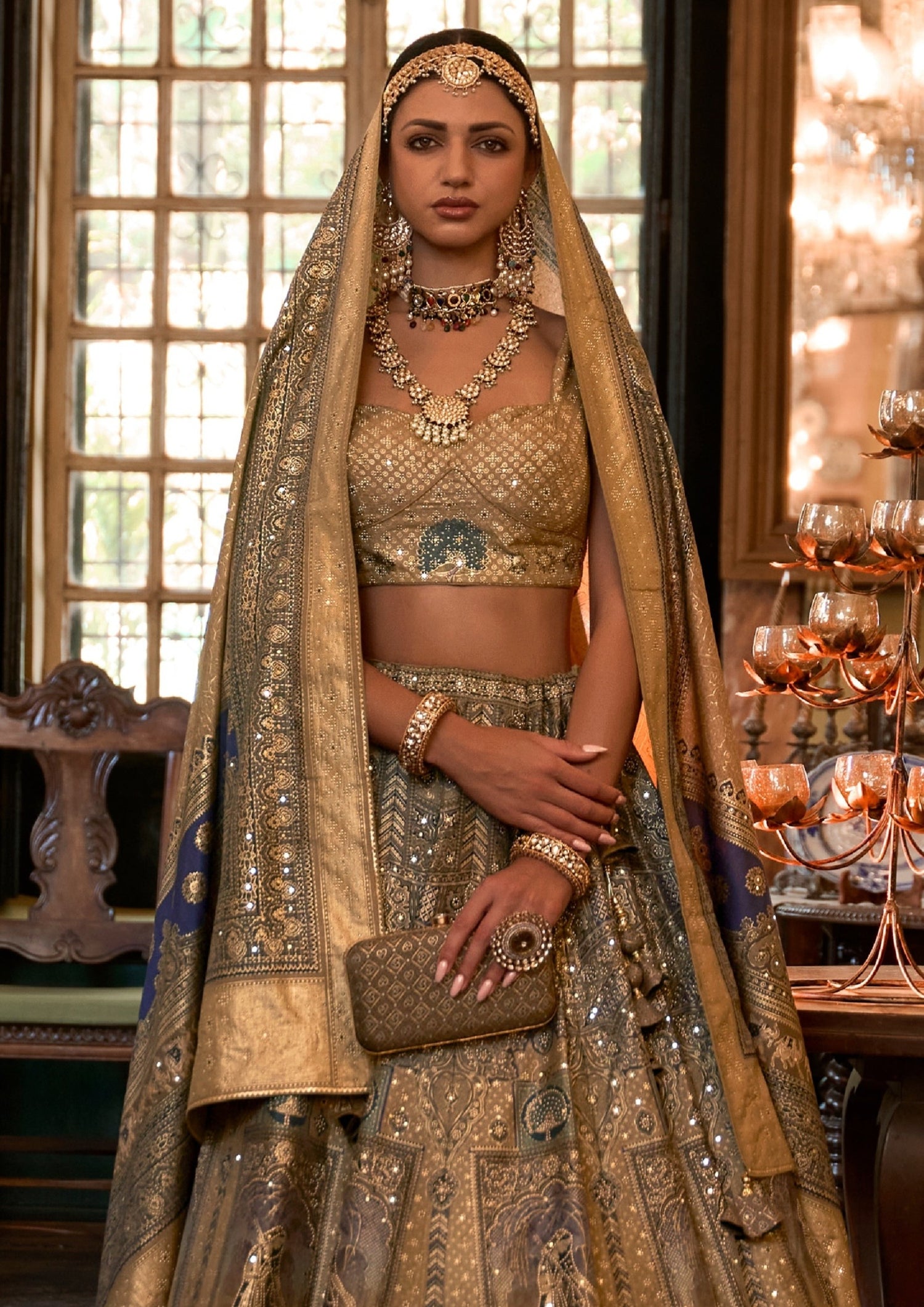 woman in golden silk lehenga choli with dupatta