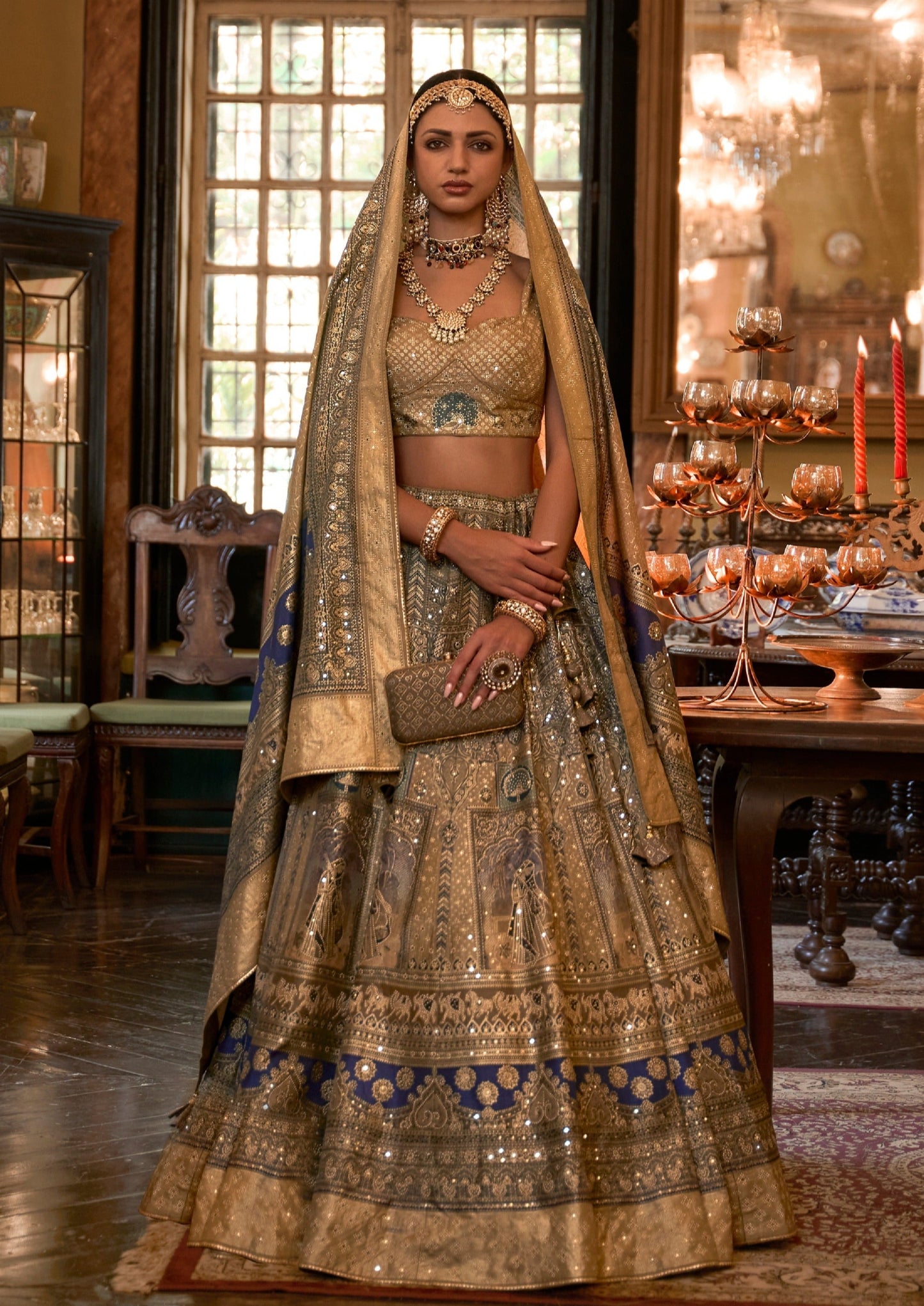 bride in golden navy blue silk lehenga choli