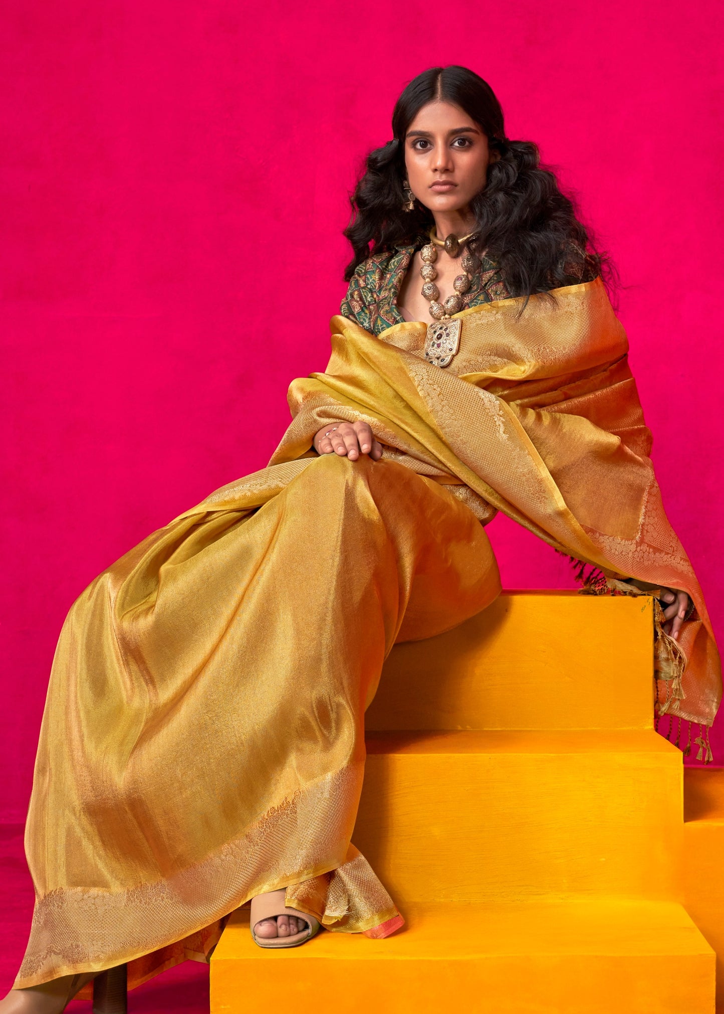 Golden yellow banarasi viscose tissue silk saree with traditional handloom design, perfect for haldi ceremony, wedding wear and festive wear.