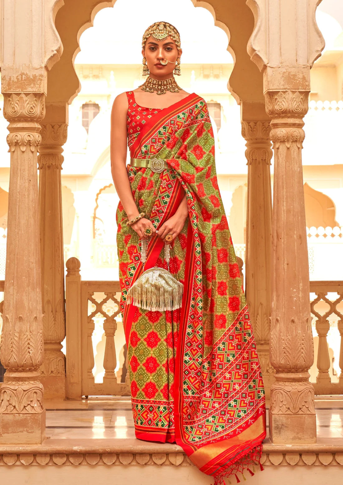 Green and red patola silk saree blouse design online.
