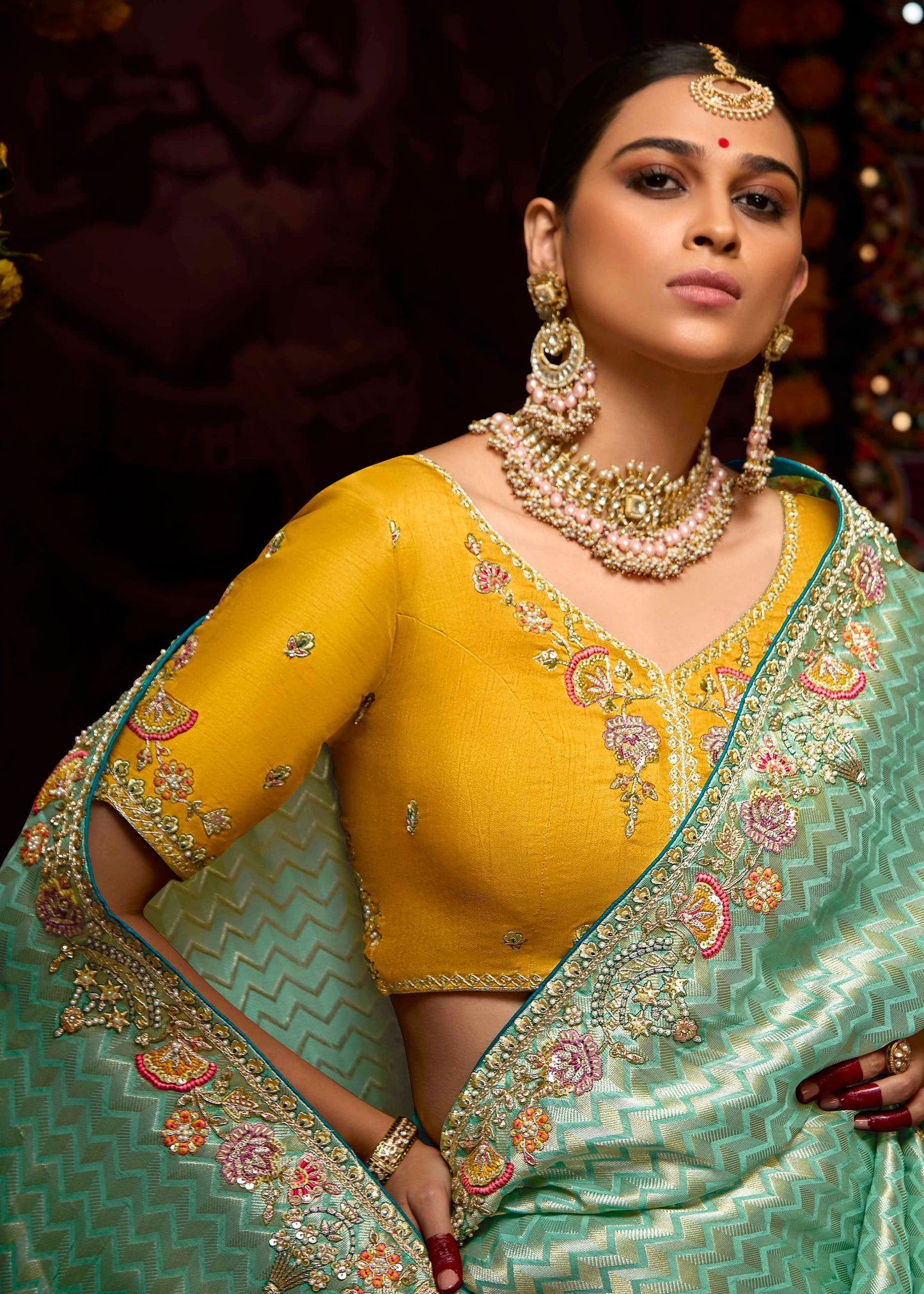 Green banarasi silk bridal saree online with detailed green & yellow hand embroidered design.