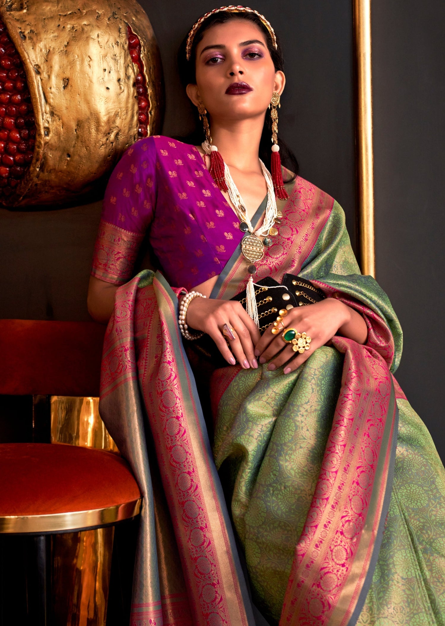 Green kanjivaram silk saree with contrast pink blouse online.