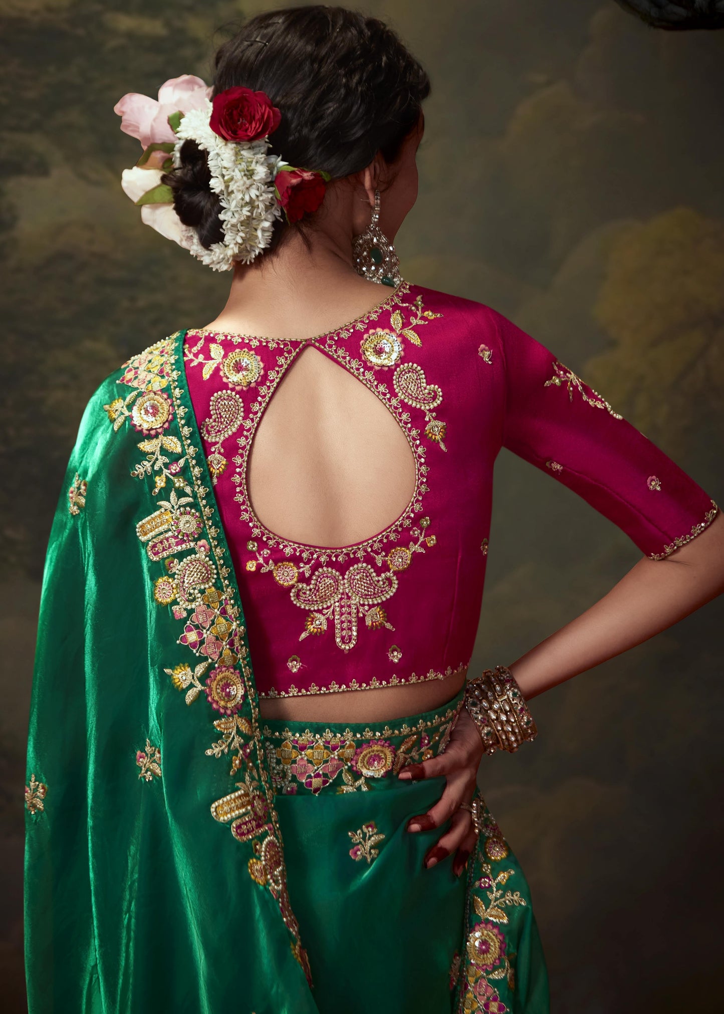 Green organza silk handwork embroidery saree online with contrast red blouse.