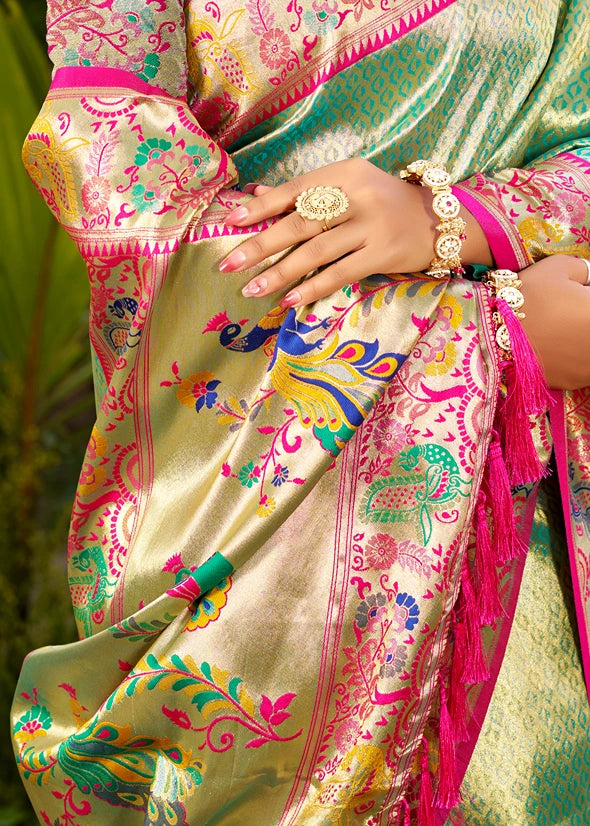 Colorful meenakari pallu design of traditional green paithani silk saree in usa with intricate peacock motifs and booti patterns.