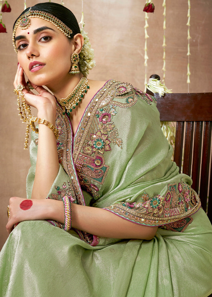 Green tissue handwork embroidery saree usa online price with pink color blouse.