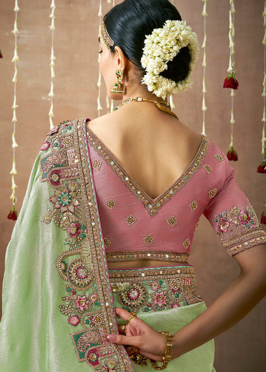 Green tissue silk saree with pink blouse in india and usa online in traditional design with handwork embroidery.