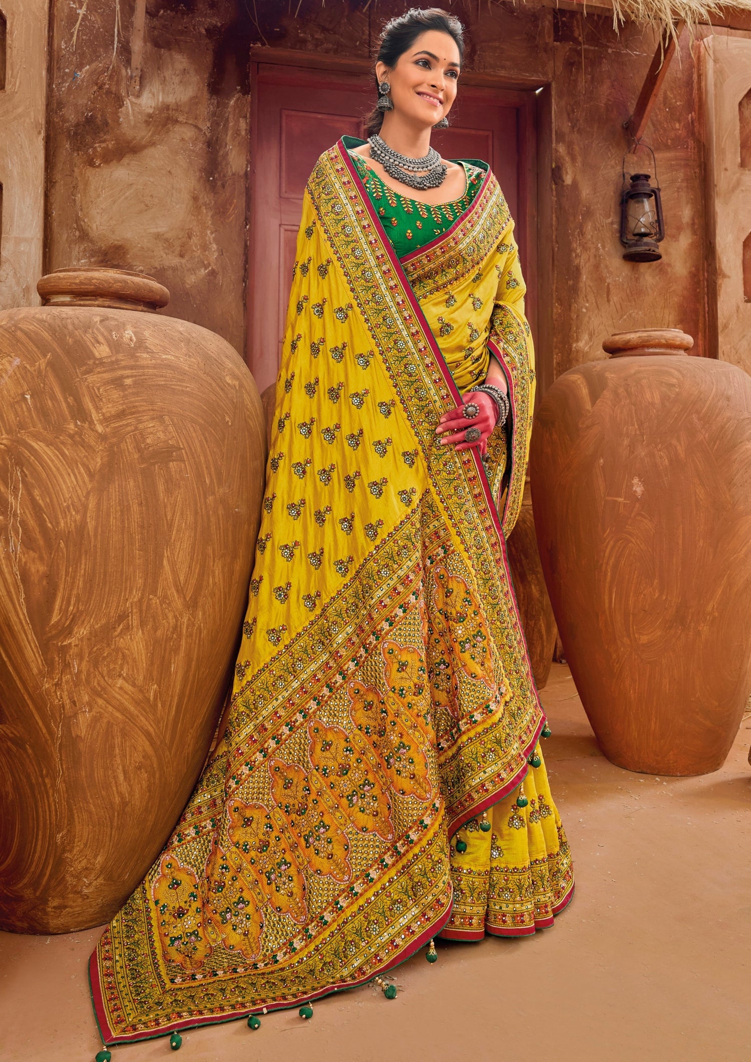 Gujarati kutch embroidery work silk yellow sarees designs online with price india usa uk uae.