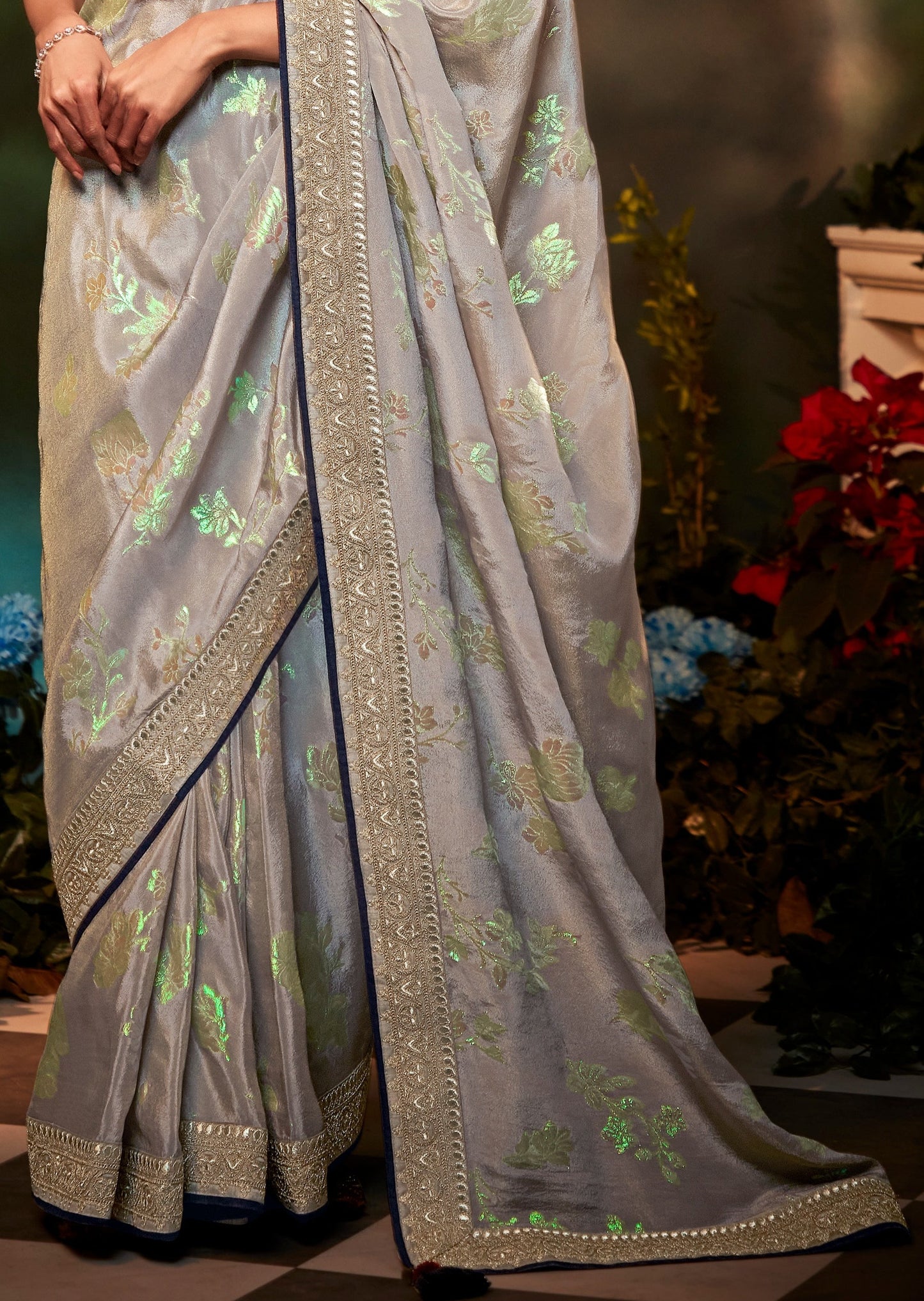 Hand embroidered banarasi satin silk silver luxury partywear fancy saree online.