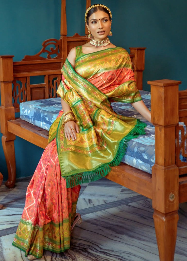 Exclusive handloom banarasi patola silk saree in orange colour with zari border available for online shopping.