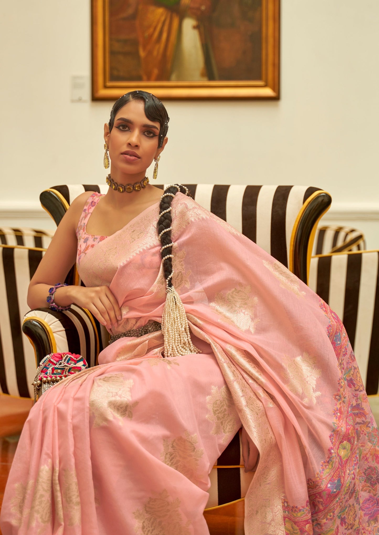 Woman in peach kashmiri Handloom saree blouse