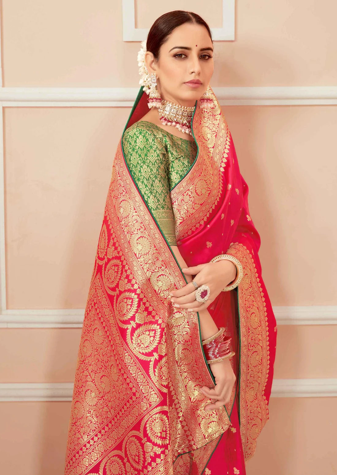 bride in Handloom Silk Red Banarasi Bridal Saree with Contrast Green Blouse wearing jewelery