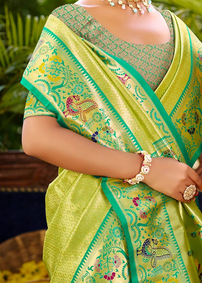 Close up of parrot green saree with floral patterns on an Indian bride; saree available in norway for online shopping.