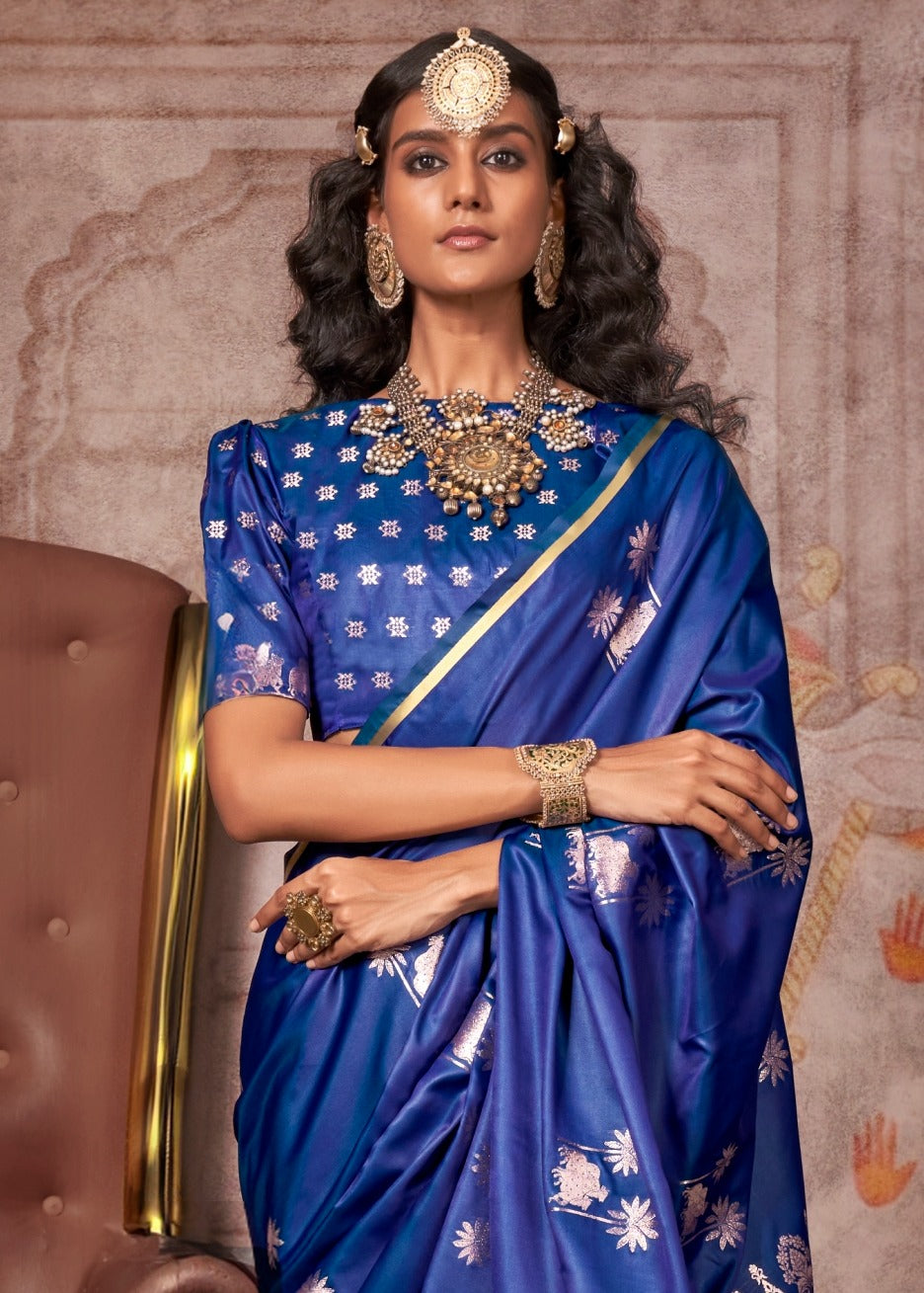 Ink blue banarasi silk saree blouse for wedding featuring pichwai designs.