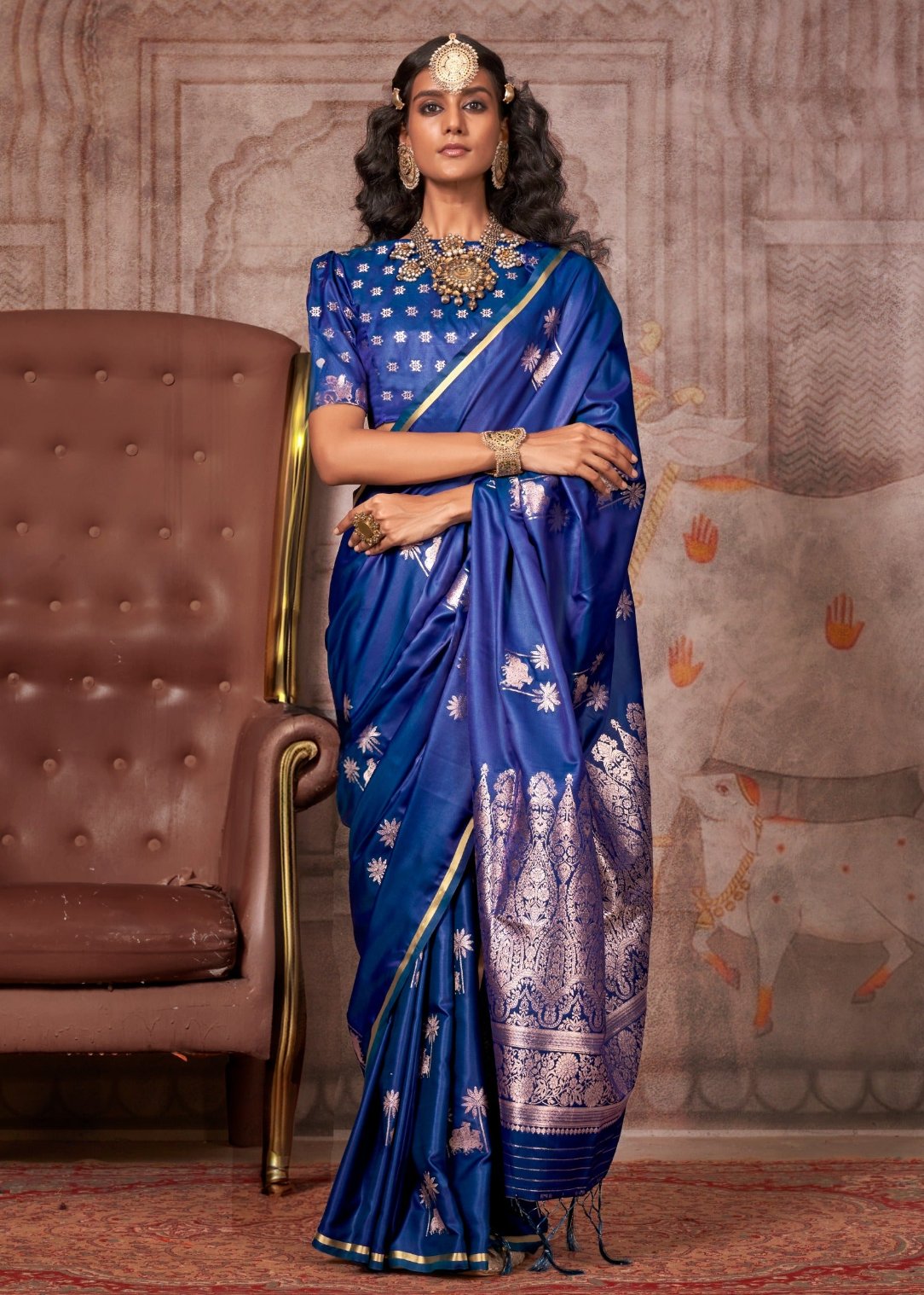 Ink blue saree with matching blouse featuring traditional banarasi zari weaving work in pure handloom satin silk.