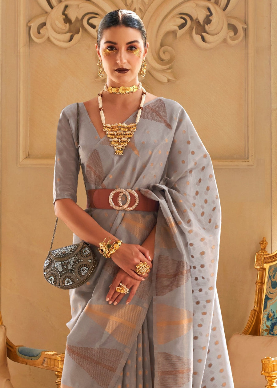 Traditional design grey kanjivaram tissue silk saree in usa with zari motifs and contrast blouse for parties and reception.