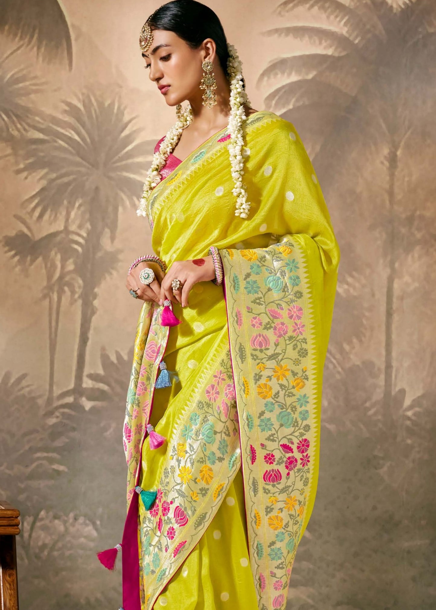 Lime yellow handloom banarasi silk luxury saree online with contrast pink blouse for wedding and festive wear.