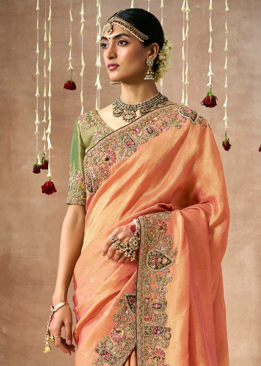 Luxury handloom banarasi tissue silk hand embroidery work orange saree online shopping for bride and women.