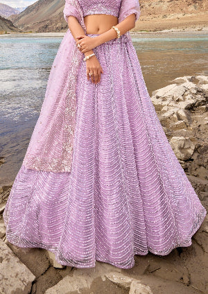 Designer luxury bridesmaids purple lehenga choli for online shopping at best price in usa uk uae london for indian wedding function.