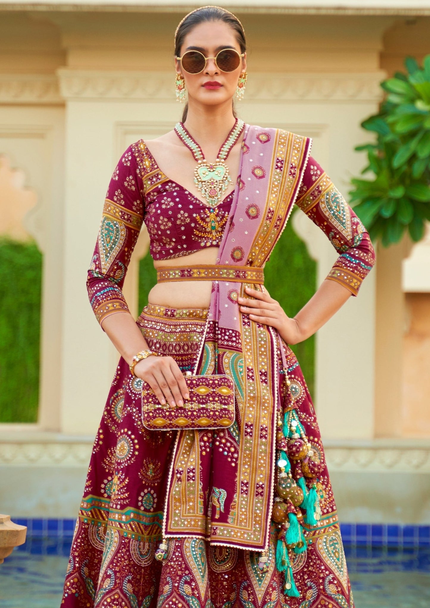 Bride in Maroon Red Designer Silk Bridal Lehenga Choli with dupatta