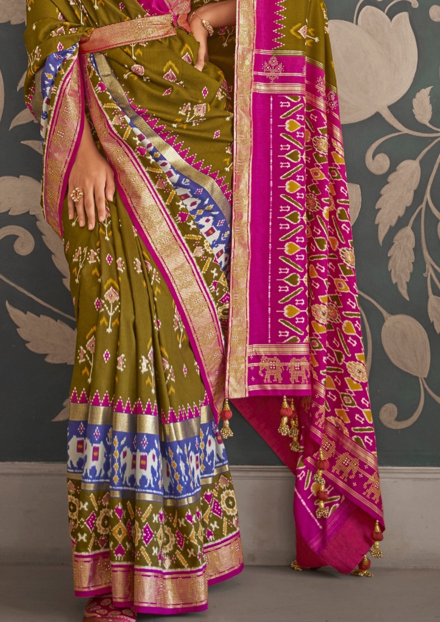 Mehendi green patola silk bridal saree online shopping for bride.