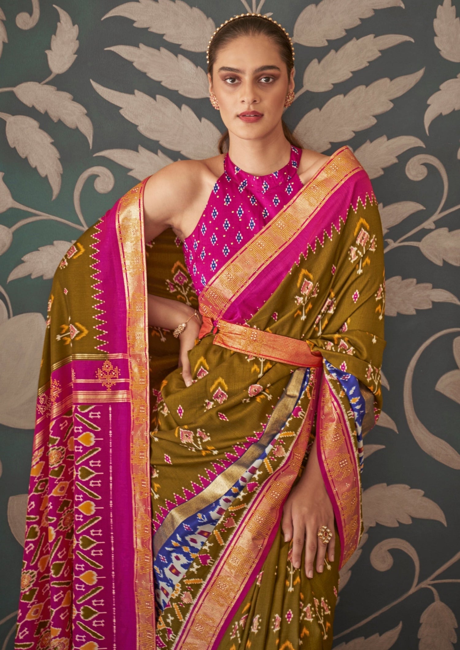 Mehendi green patola silk bridal saree online shopping for wedding.