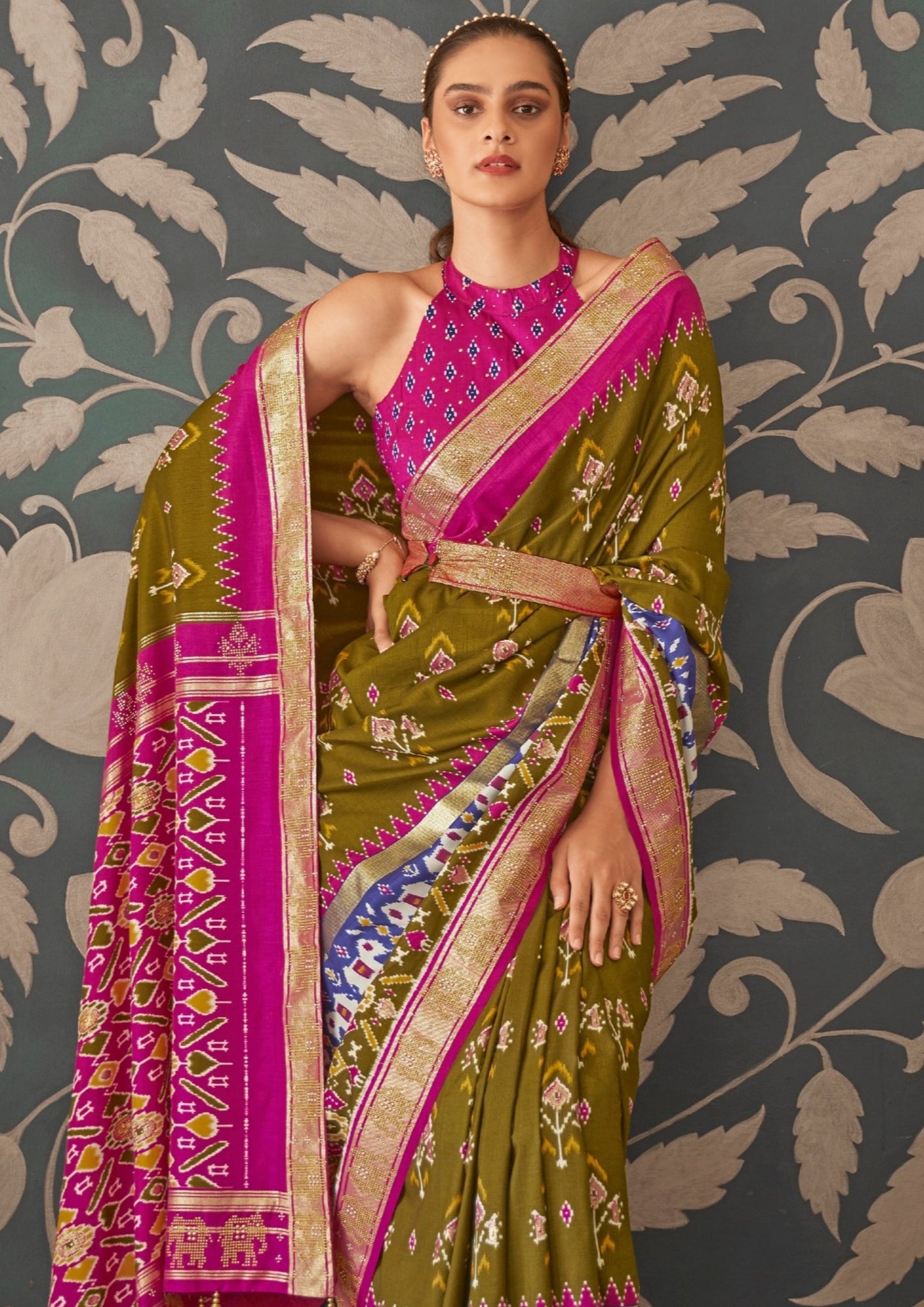Mehendi green patola silk saree online shopping for bride.