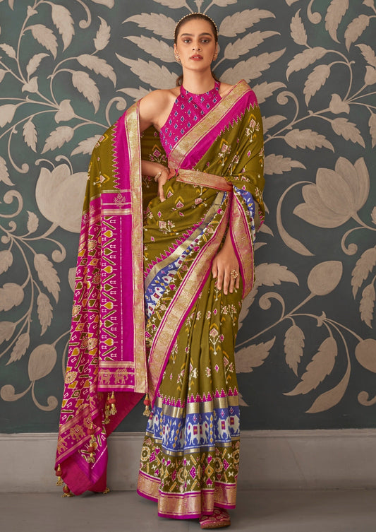 Mehendi green patola silk saree online for wedding.
