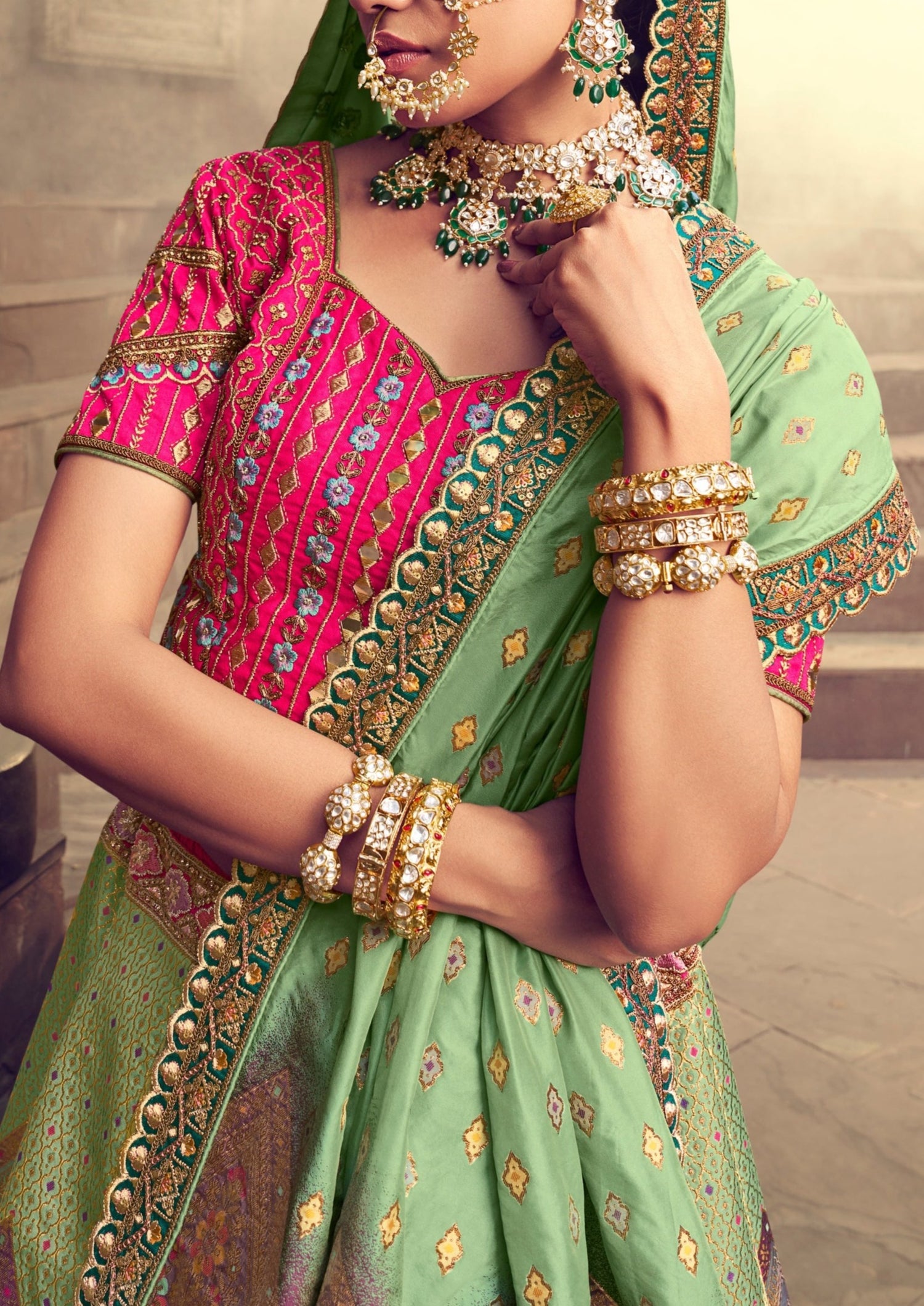 Mint green and pink banarasi silk unstitched bridal lehenga choli online with price.