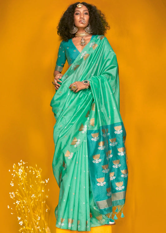 Pure handloom ocean green tussar silk saree with dark green two-tone effect, perfect for traditional wedding events.