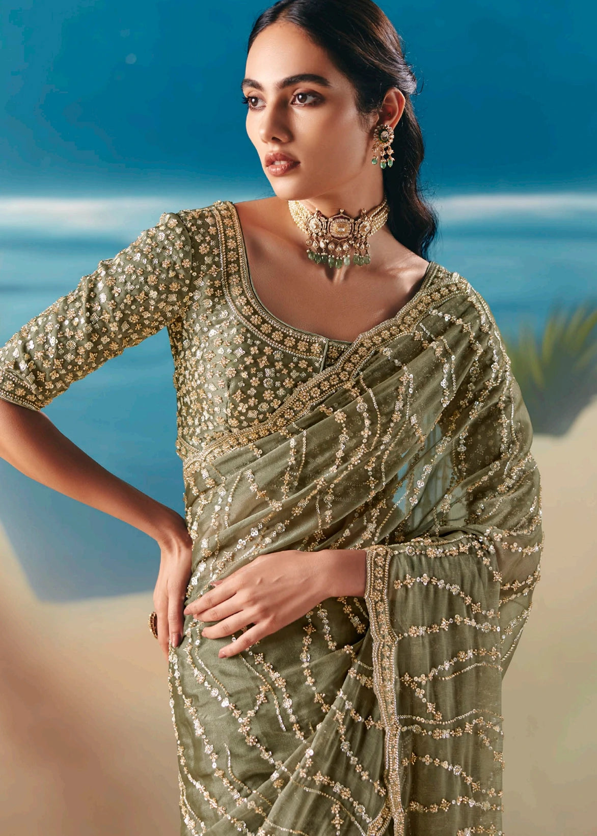 Elegant olive green tissue silk bridal saree online with hand embroidered beadwork and sequins for engagement and sangeet. 