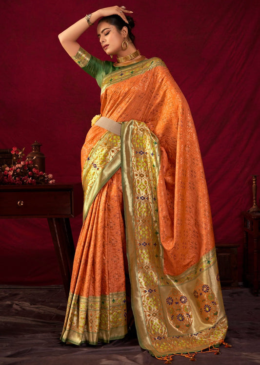 Shop orange paithani patola fusion banarasi silk saree online with contrast green blouse.