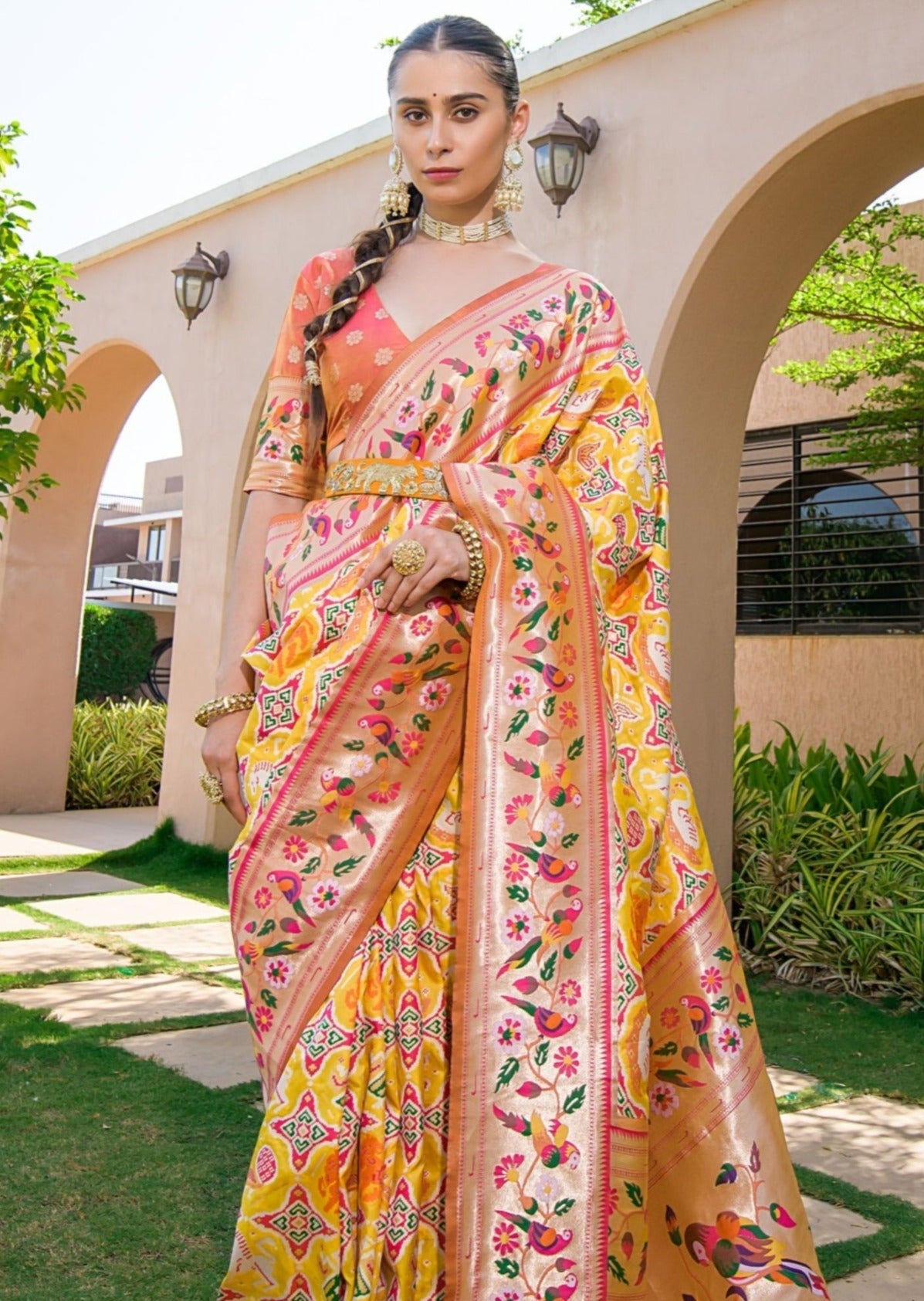 Orange patola silk saree online shopping with price in latest designs.