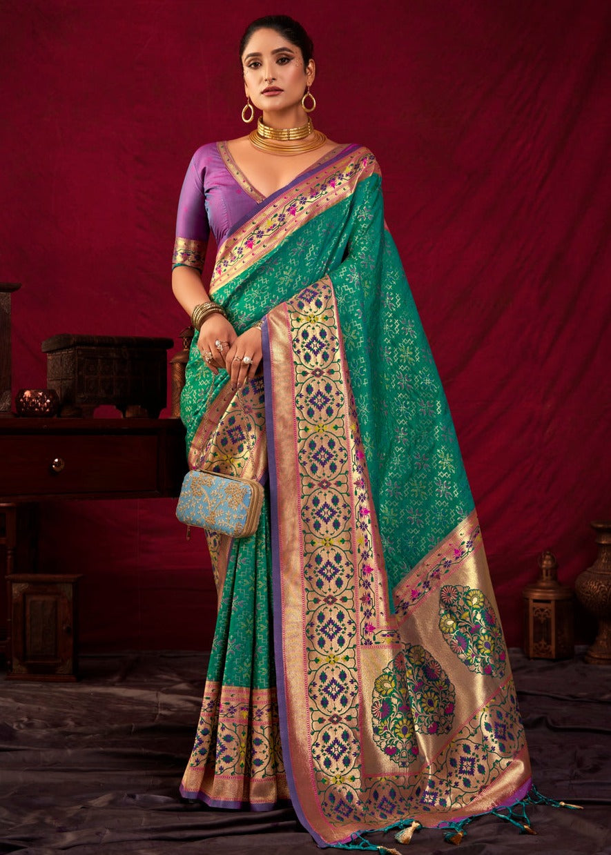 Paithani saree london online shopping in green color with contrast purple blouse.