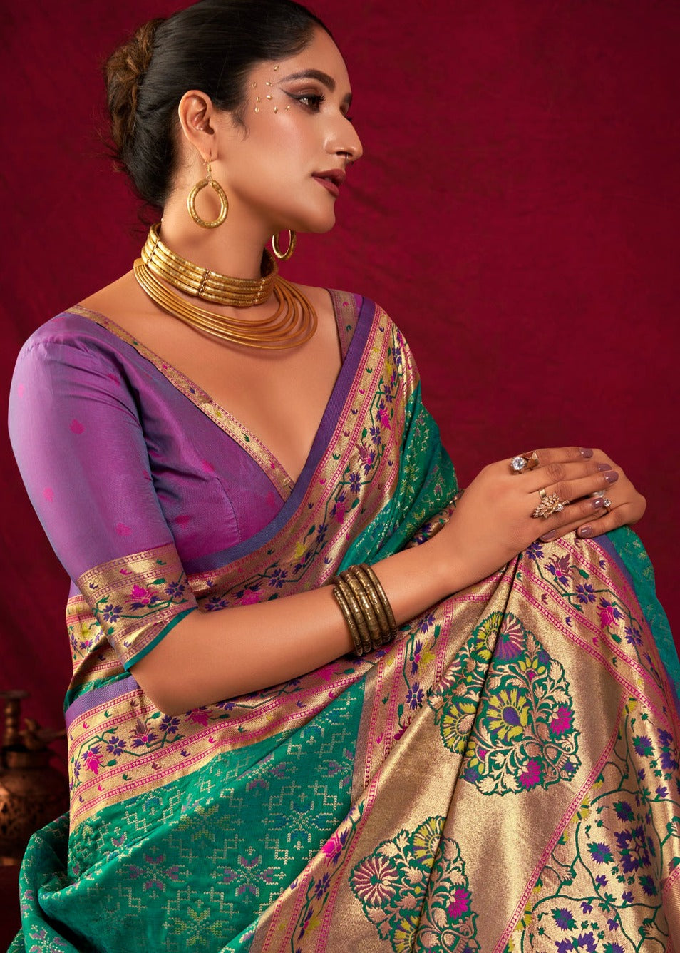 Pure patola paithani handloom sarees london online shopping in green color with contrast purple blouse.