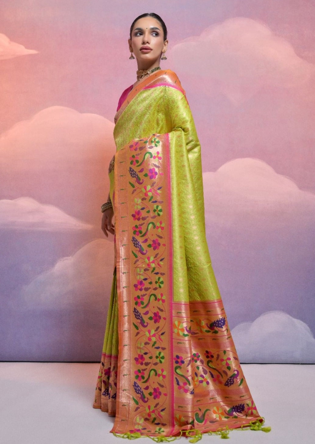 Parrot green paithani silk handloom saree with triple muniya border.