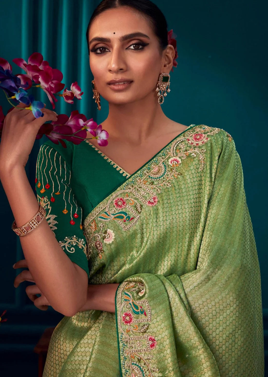 Party wear banarasi silk green embroidery work saree online for wedding.