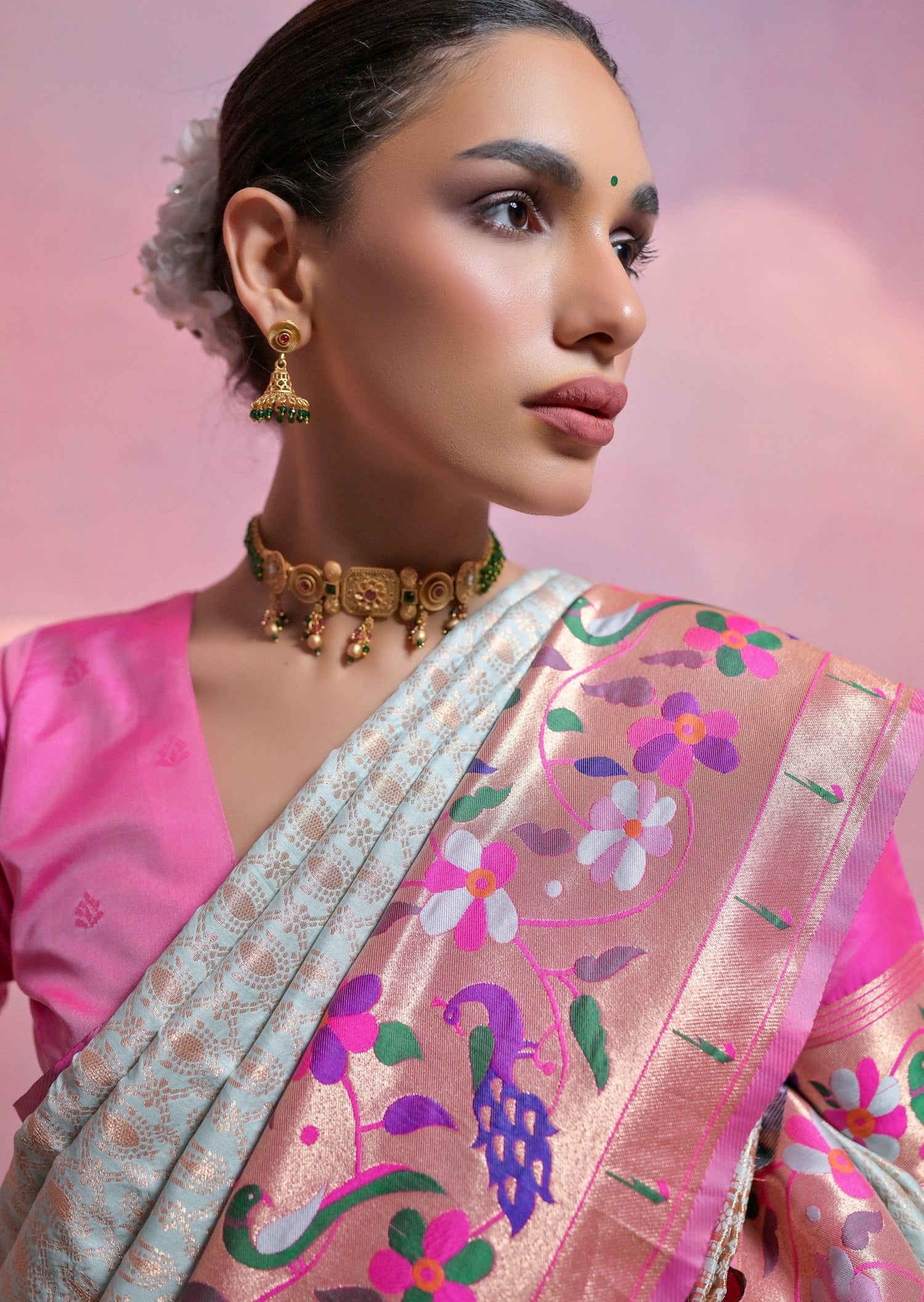 Pastel blue paithani silk handloom saree blouse designs online.