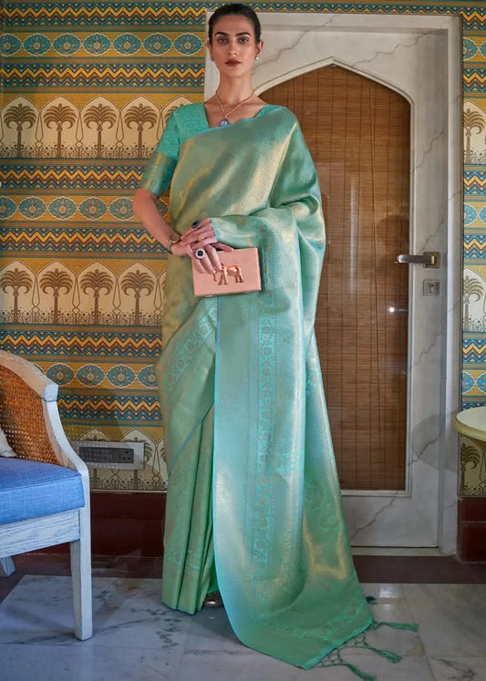 Pastel green kanjivaram silk saree with gold zari embroidery for festive and wedding wear, free shipping in USA and worldwide.