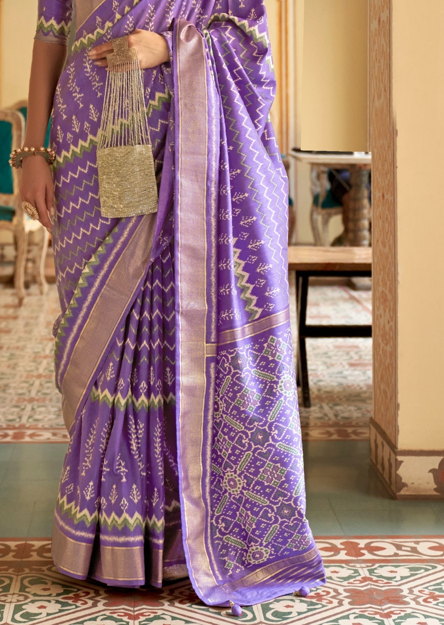 Pastel purple colour patola silk saree online shopping for indian women.